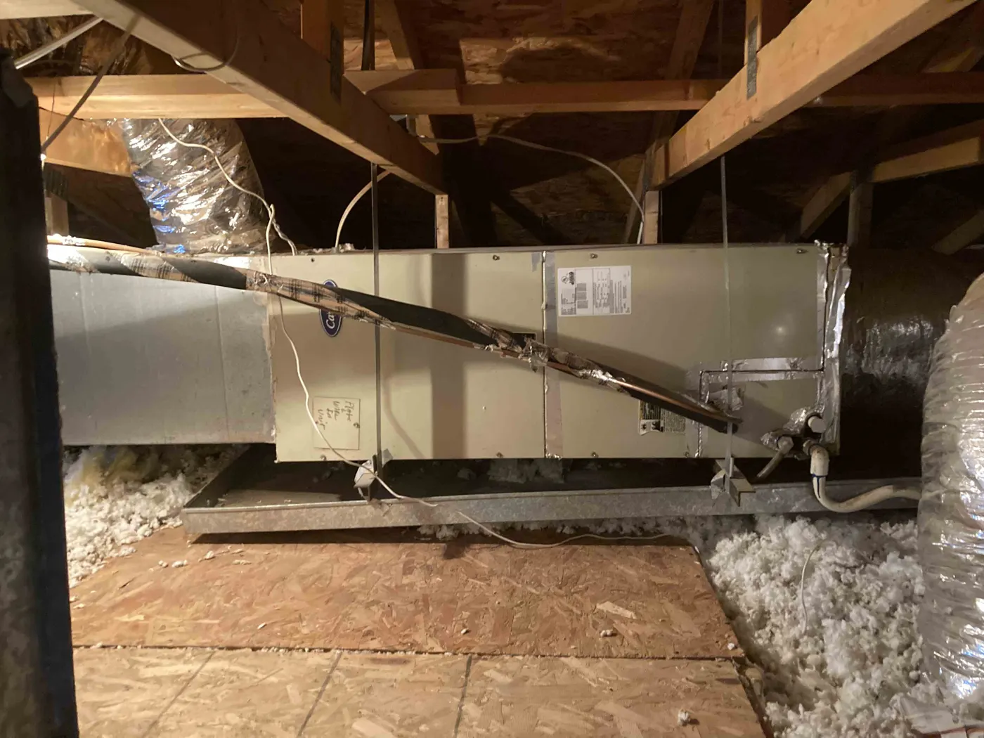 Air handler and ductwork in an attic