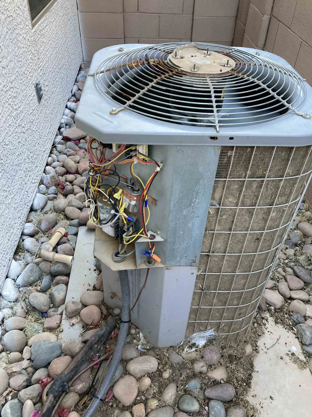Outdoor condenser with deteriorated wiring found during service